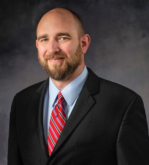 A headshot of Attorney Casey J. Hemmer